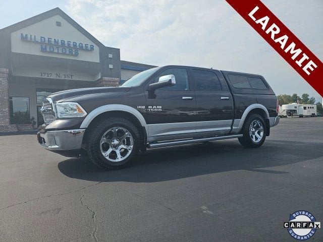 2017 RAM 1500 Laramie in Brown — front three-quarter view