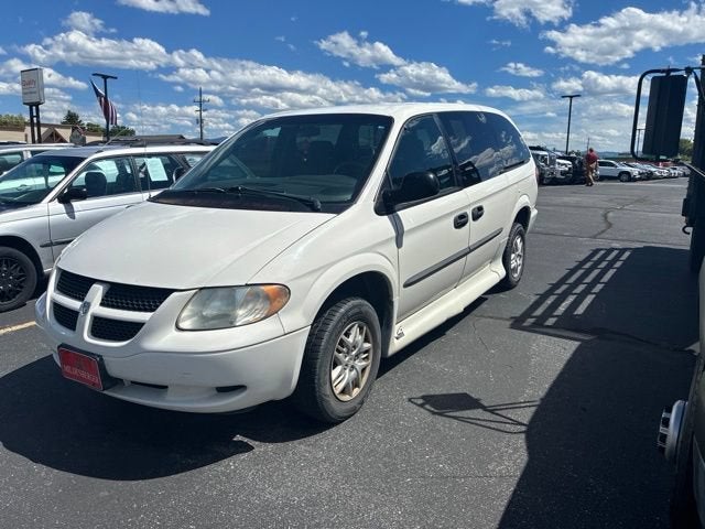 2004 Dodge Caravan SE in White — front three-quarter view