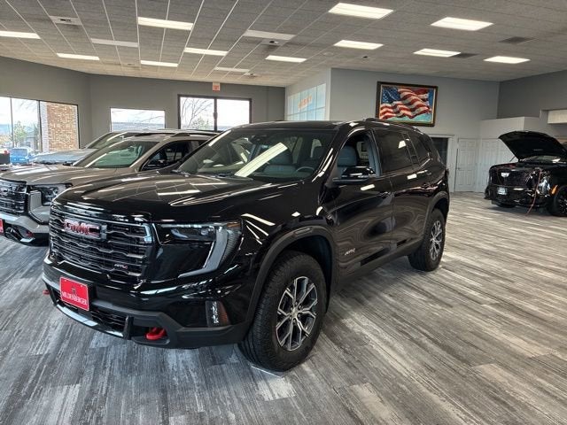 2026 GMC Acadia AT4 in Ebony Twilight Metallic — front three-quarter view