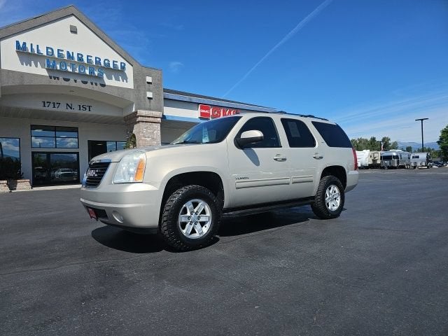 2011 GMC Yukon SLT in Gold Mist Metallic — front three-quarter view