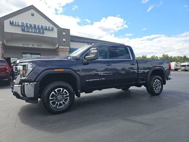 2026 GMC Sierra 2500 HD SLE in Titanium Rush Metallic — front three-quarter view