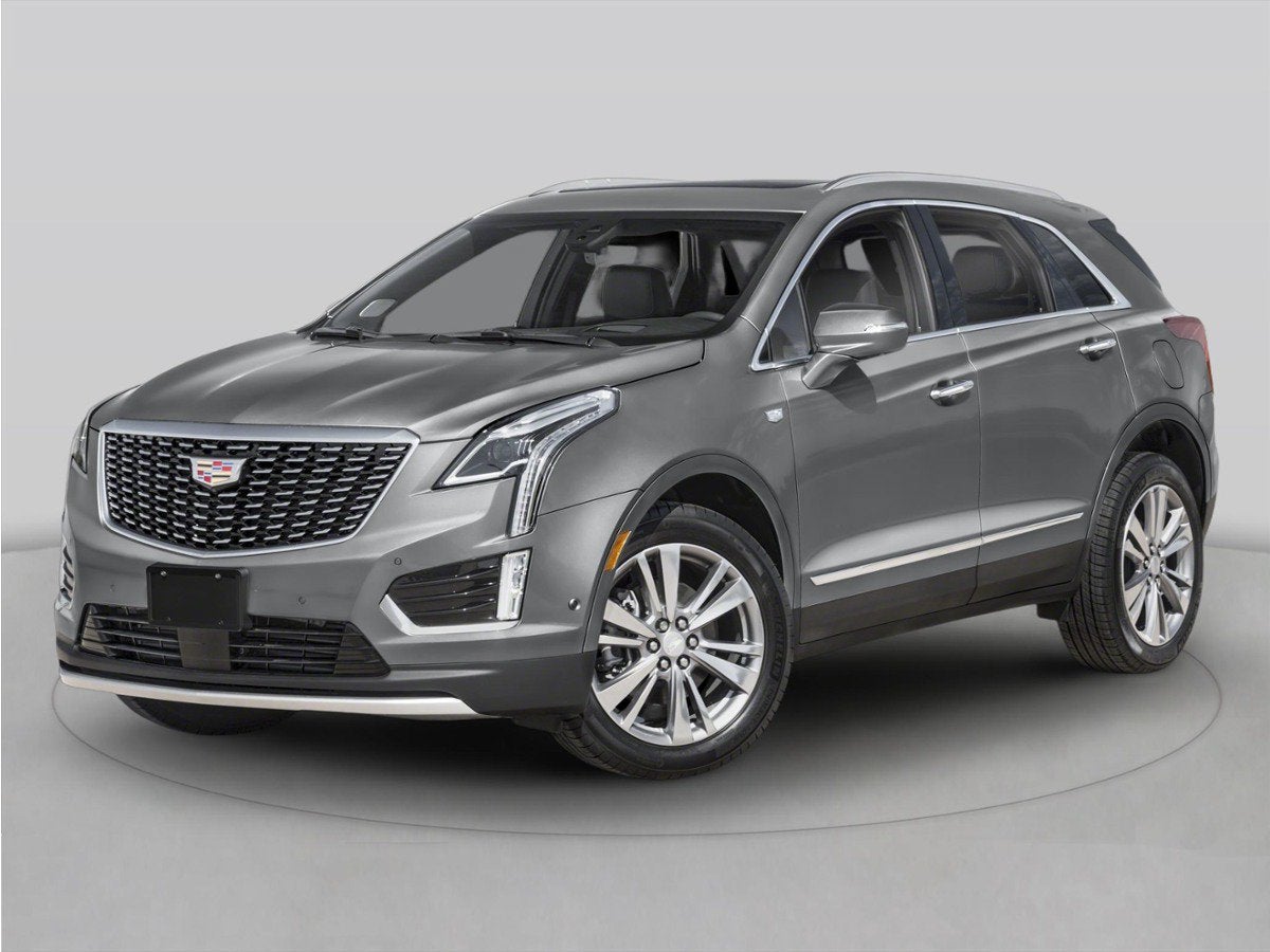 2026 Cadillac XT5 Sport in Opulent Blue Metallic — front three-quarter view